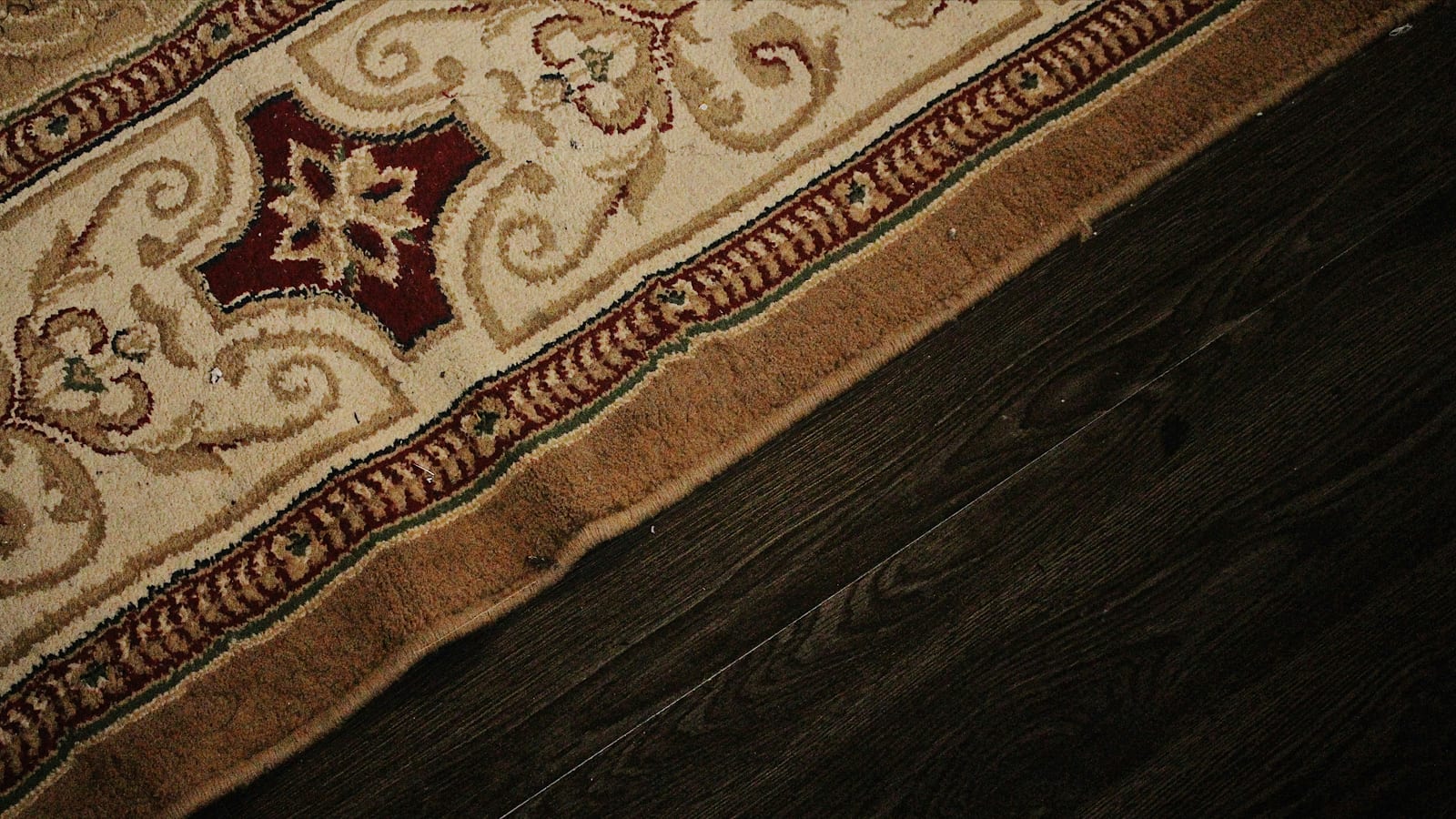 brown and beige floral area rug