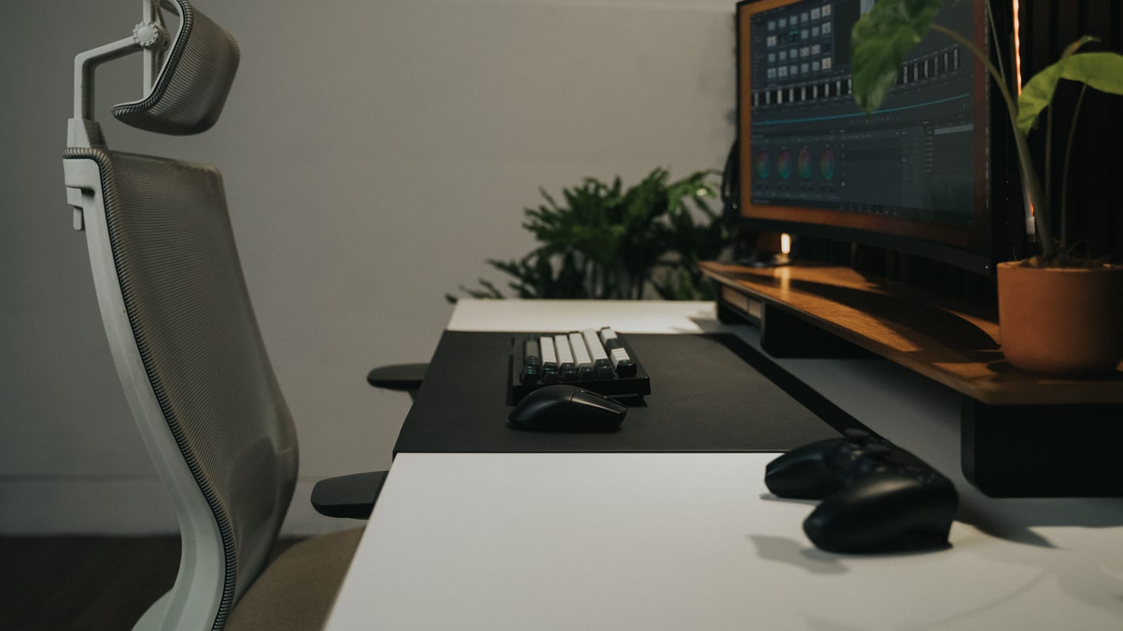 Sleek modern workspace featuring an ergonomic chair and dual monitors, perfect for gaming and productivity.
